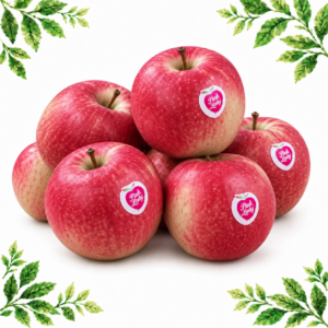 Pink-red and yellow apples with Pink Lady stickers on a white background framed by illustrated green leaves.