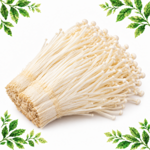 Bundle of white enoki mushrooms with long fine stems and tiny caps on a white background framed by illustrated green leaves.