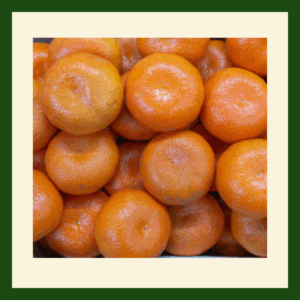 Fresh Nadorcott satsumas with bright orange skin and easy-peel texture.