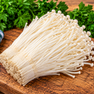 Fresh White Enoki Mushrooms with long slender stems and small white caps