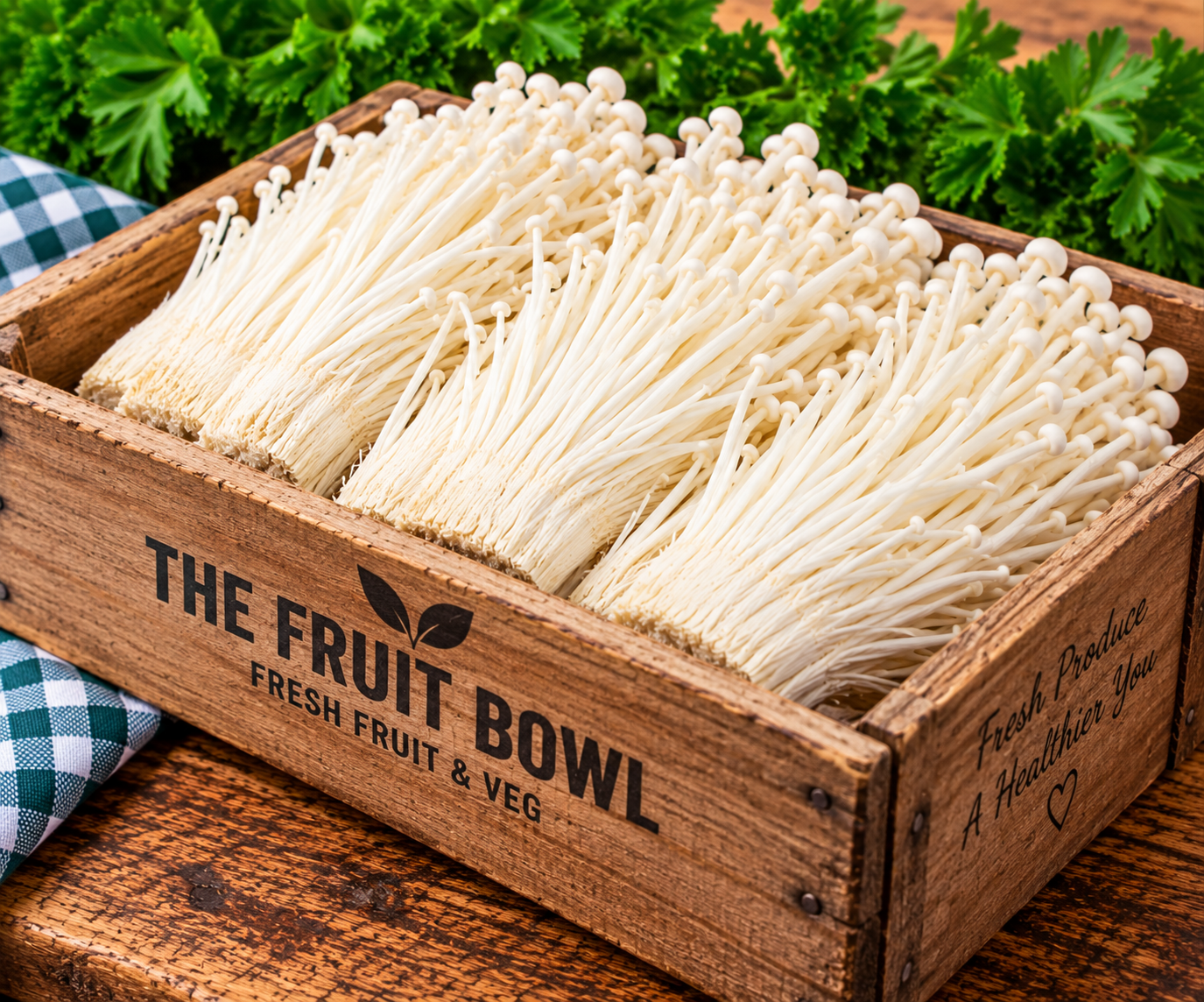 Fresh White Enoki Mushrooms displayed in a rustic wooden market crate