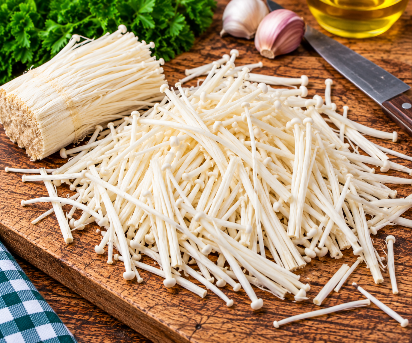 Fresh White Enoki Mushrooms trimmed and separated ready for cooking