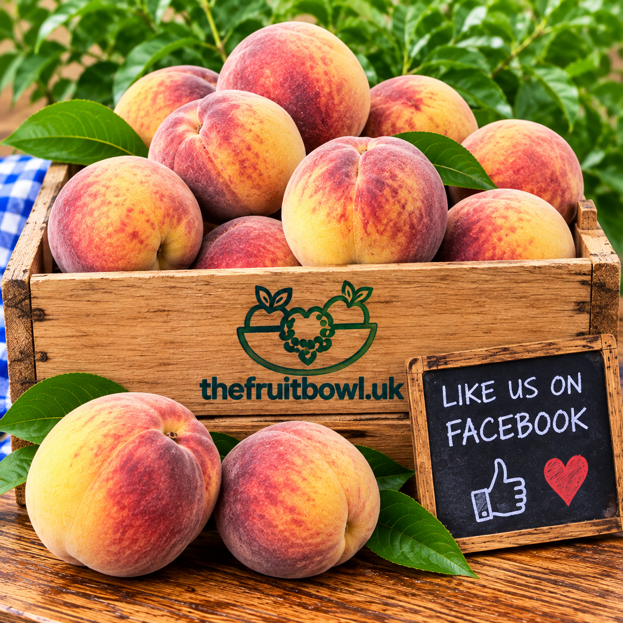 Fresh Sweet Juicy Peaches displayed in The Fruit Bowl wooden market crate