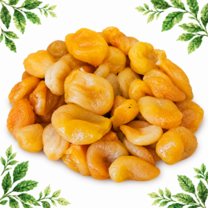 A pile of golden dried apricots on a white background with green leafy corners.