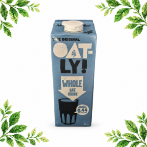 A blue 1 litre carton of Oatly Whole Oat Drink on a white background with green leafy corners.