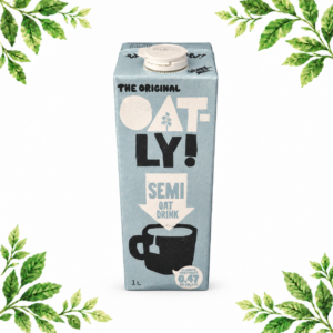A blue-grey 1 litre carton of Oatly Semi Oat Drink on a white background with green leafy corners.