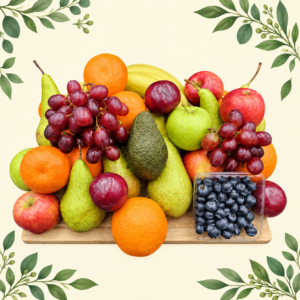 The Mighty Fruit Box with apples, pears, oranges, bananas, red grapes, plums, blueberries and an avocado on a cream leafy background.