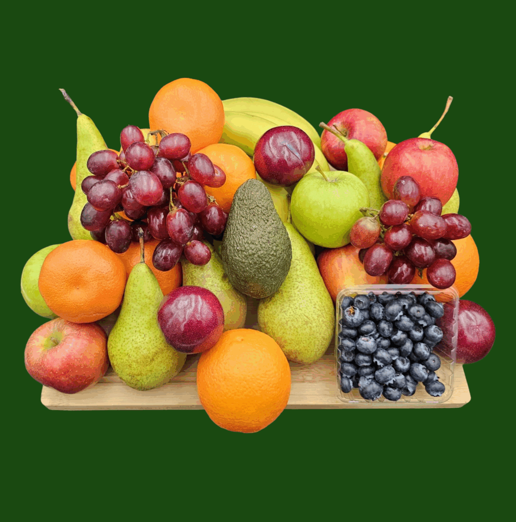 Mighty fruit box with bananas, apples, pears, oranges, grapes, plums, blueberries and avocado